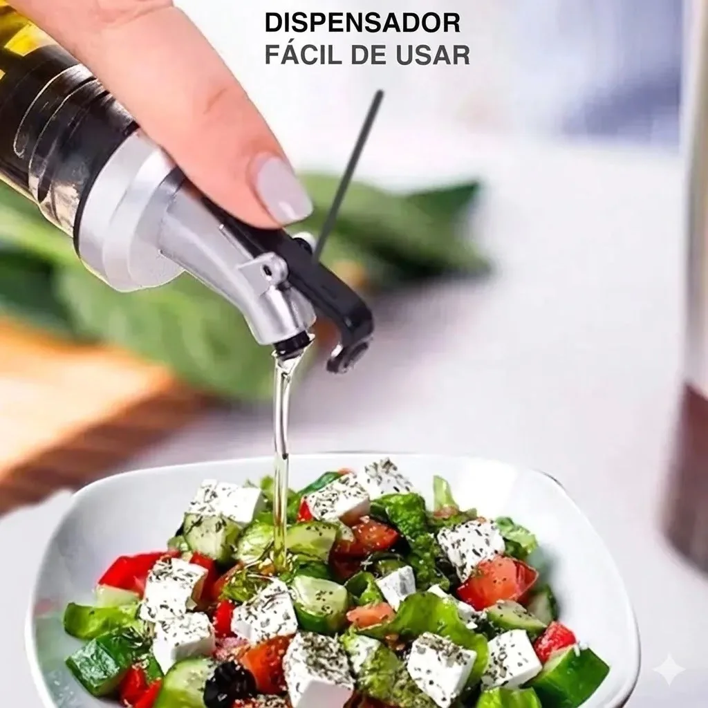 Dispensador sirviendo aceite sobre una ensalada