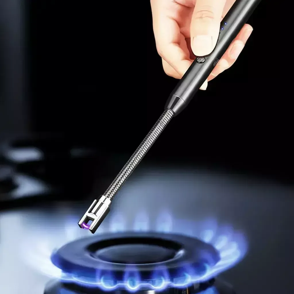 Encendedor eléctrico de cuello flexible prendiendo una hornalla